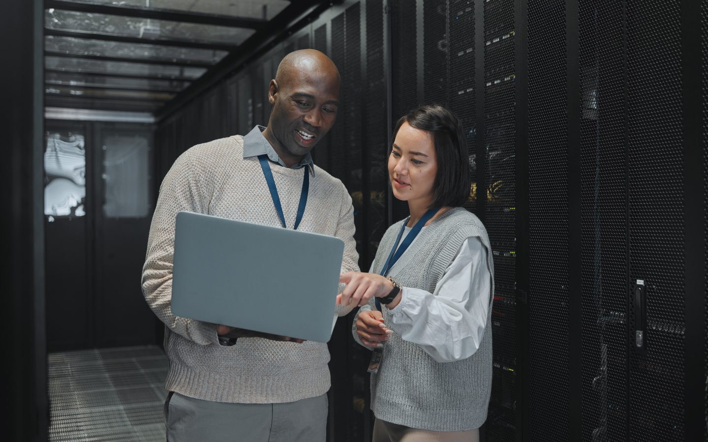 business-black-man-and-woman-with-laptop-servers-and-cyber-security-for-connection-data-analytic-e1694528509419